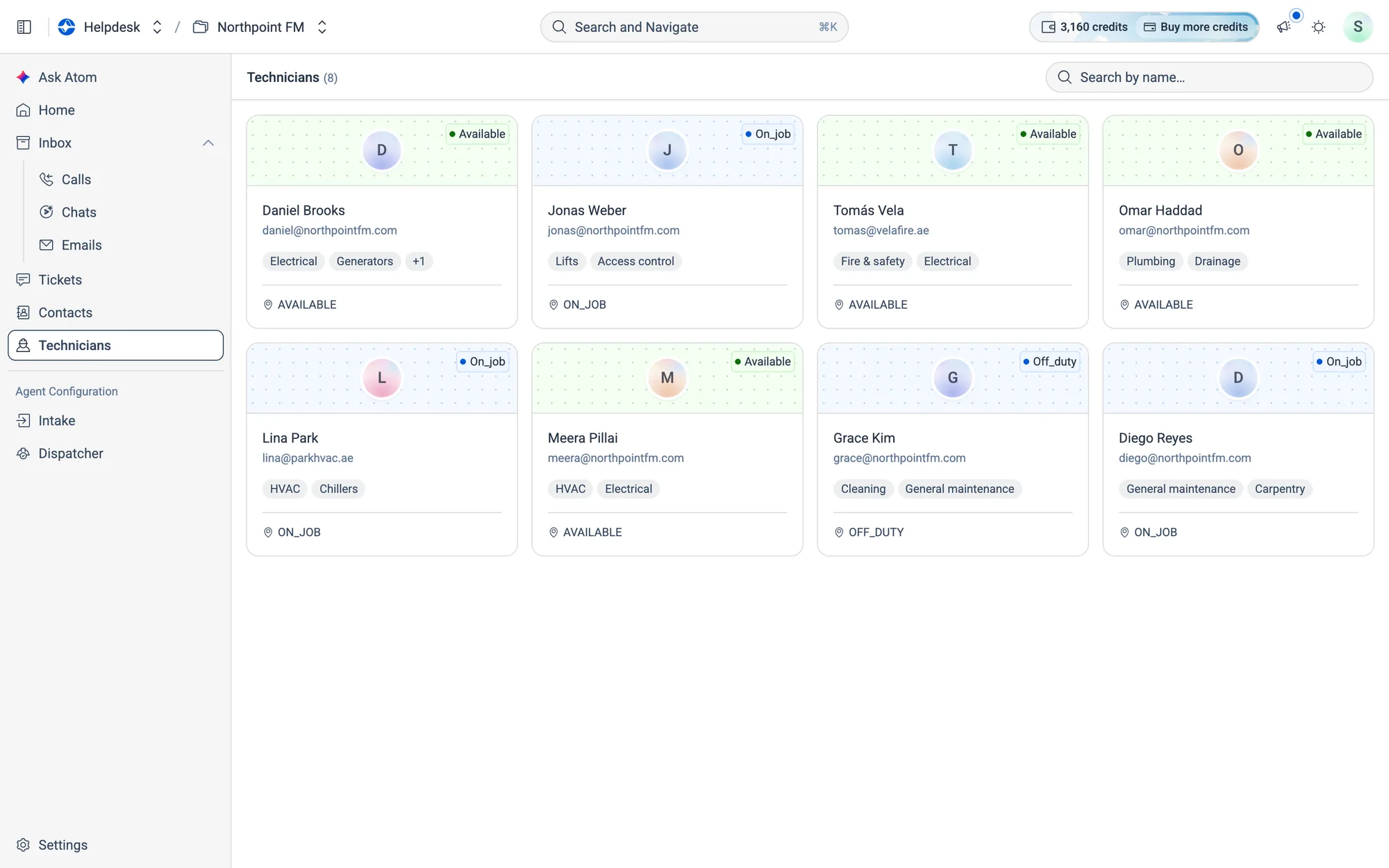 Each card shows the technician's live status, contact details and top skills.